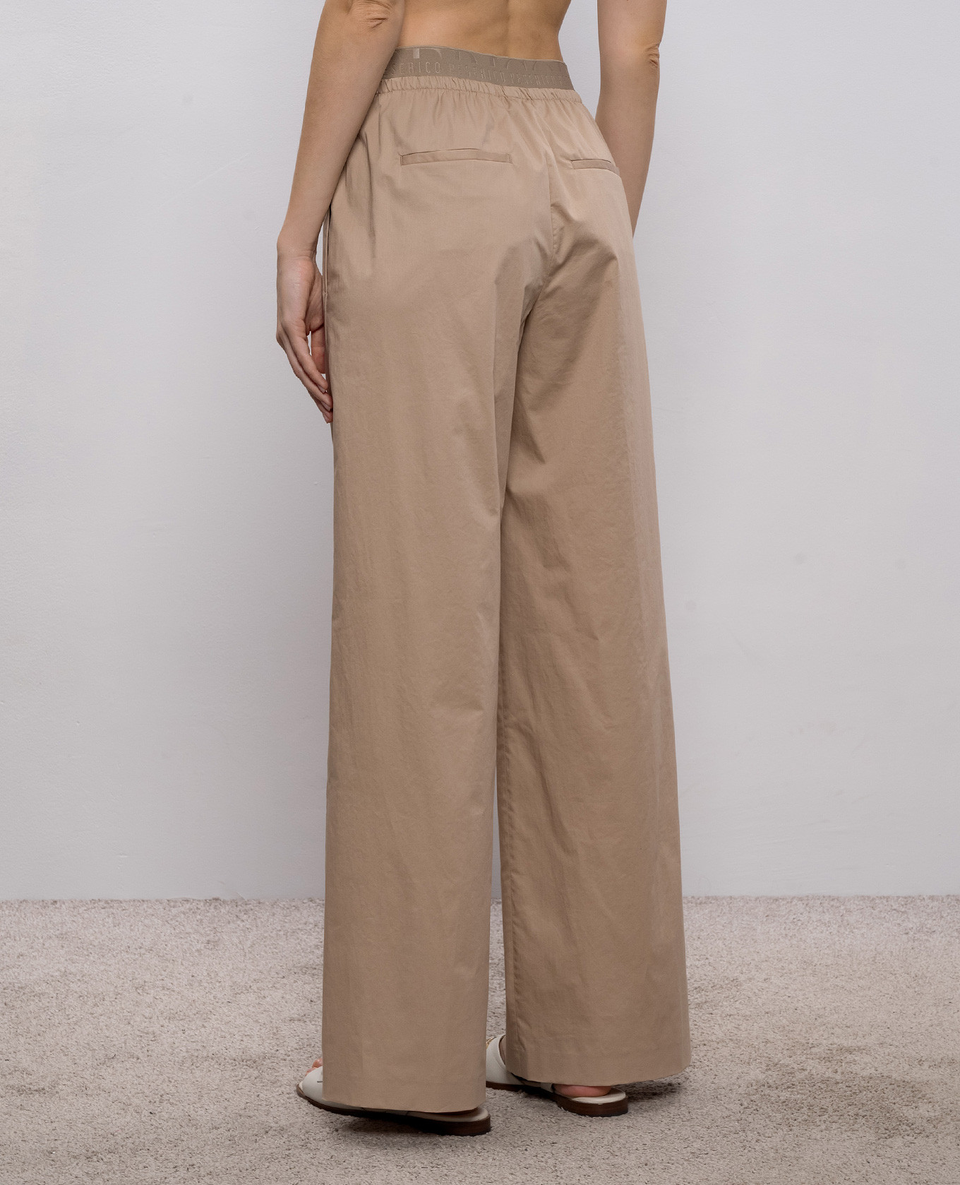 

Beige pants with logo pattern Peserico