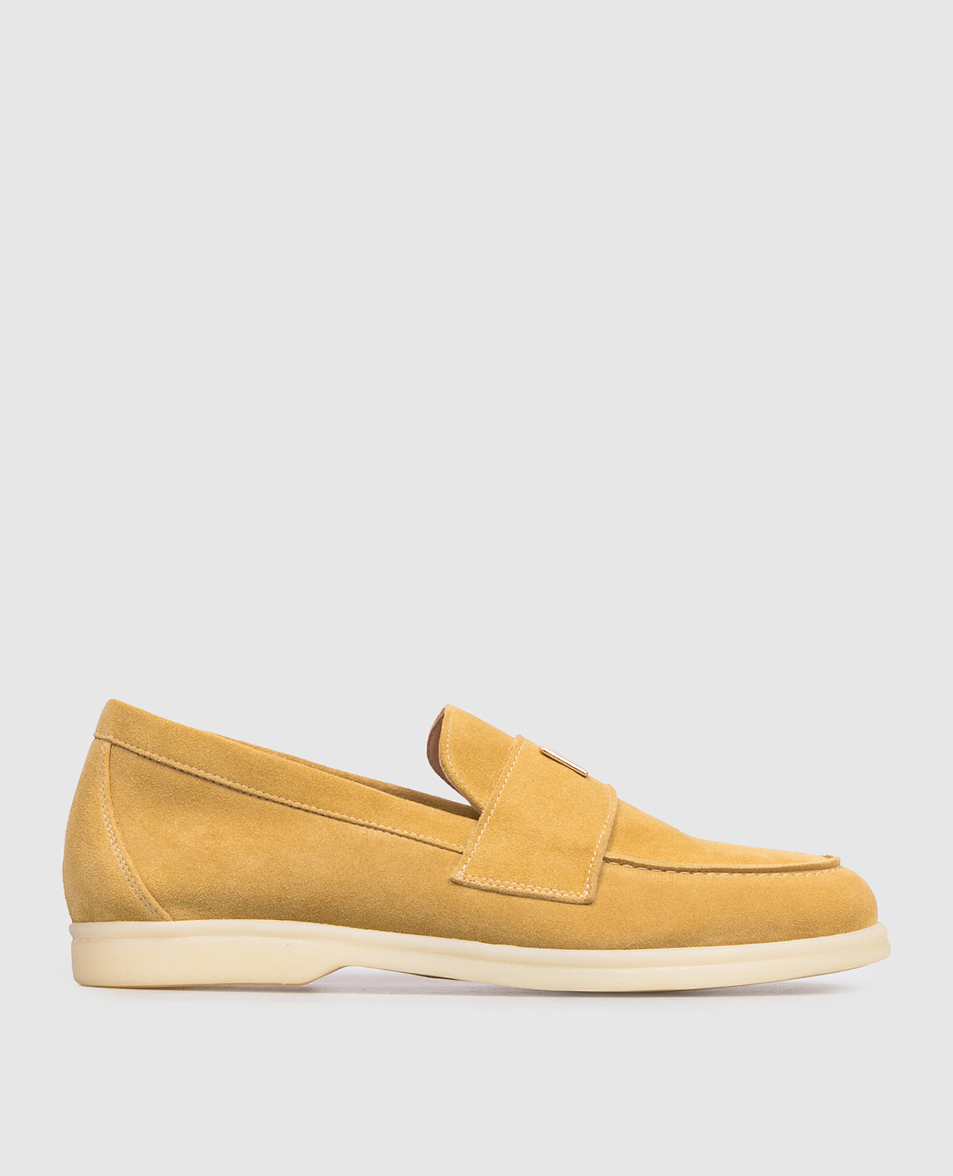 Yellow suede loafers with logo engraving