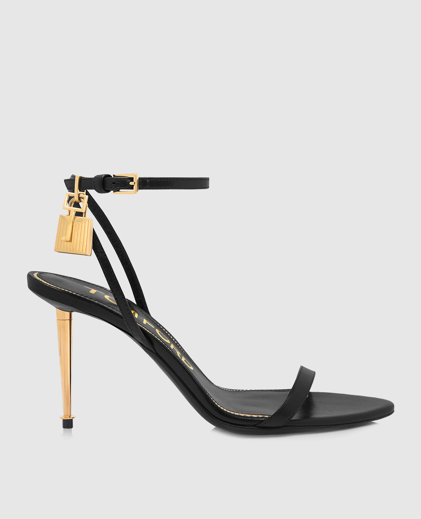 

Black leather sandals with a pendant Tom Ford