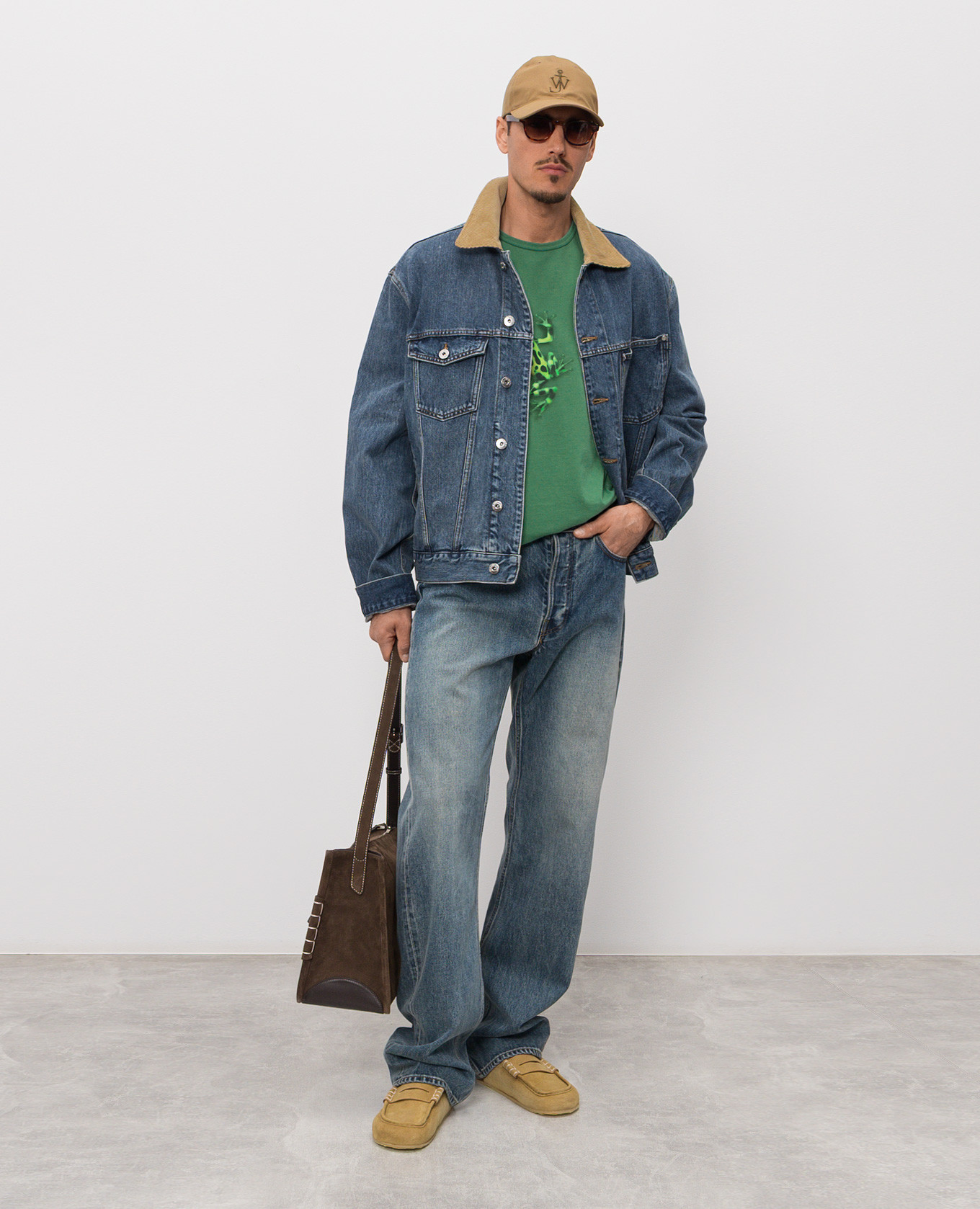 

Blue jeans with a worn effect JW Anderson