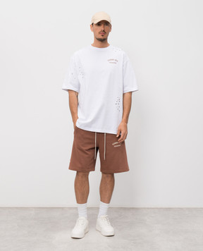 Comme des Fuckdown Brown shorts with logo print and slits FMS6CFABM01925