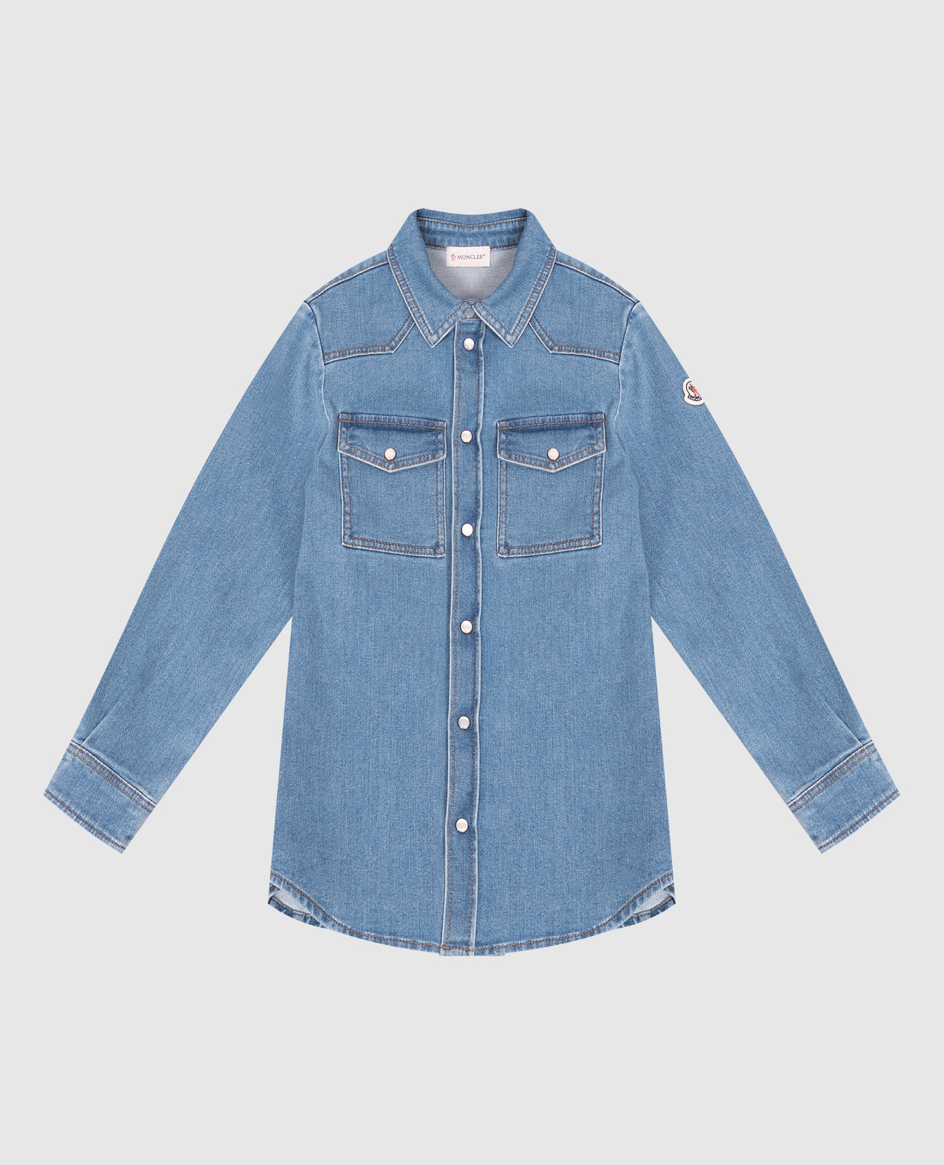 Children's blue denim shirt with a patch