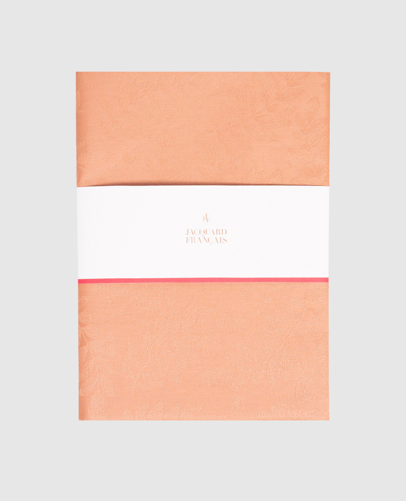 Oranje tafelkleed met plantaardige print, gemaakt van katoen.