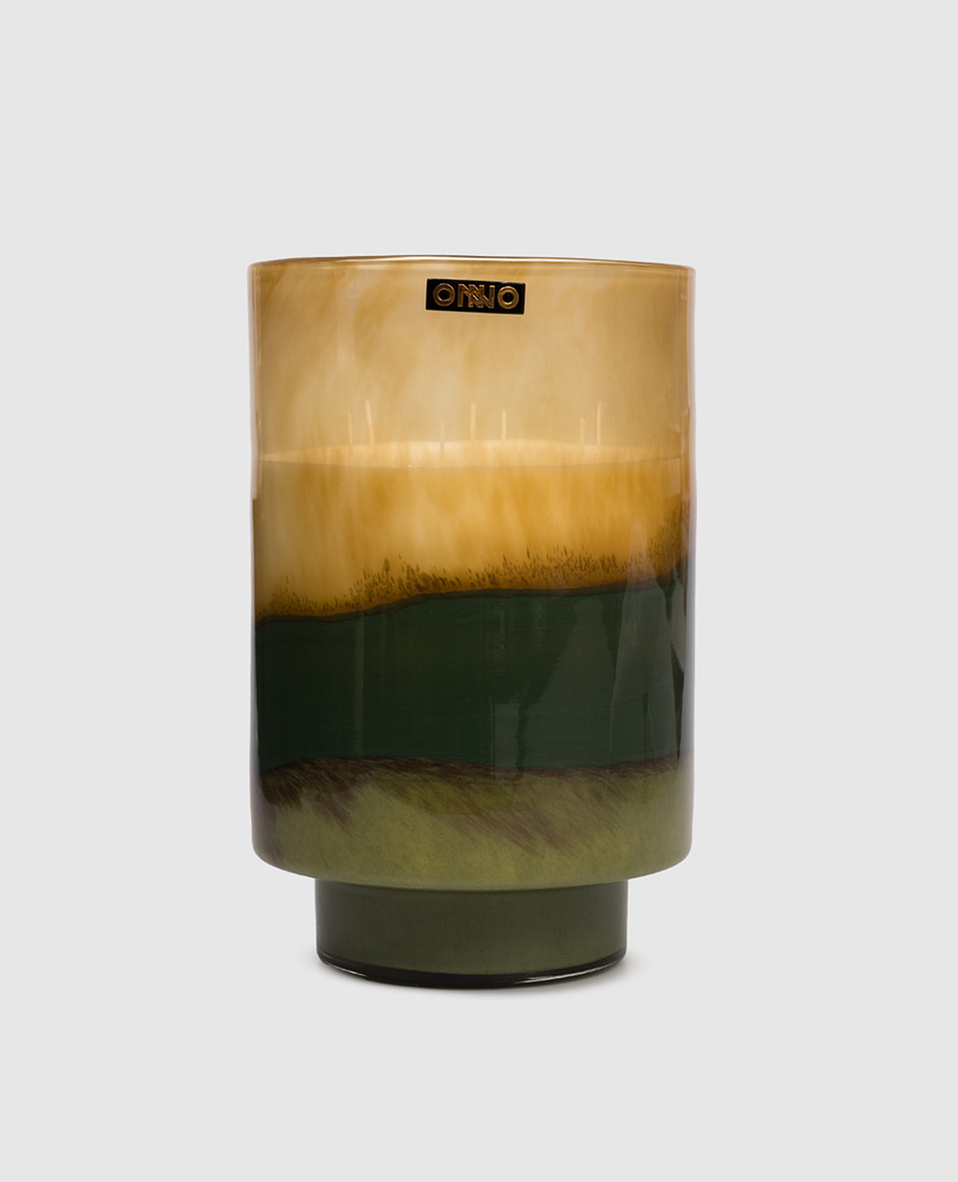 

Art Jane  candle with True Fig scent in a glass candle holder Onno, Green