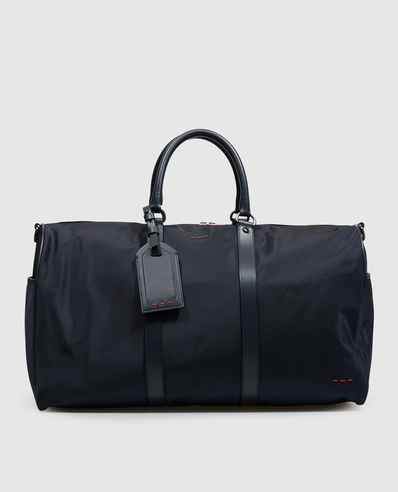 Blue travel bag with metal logo