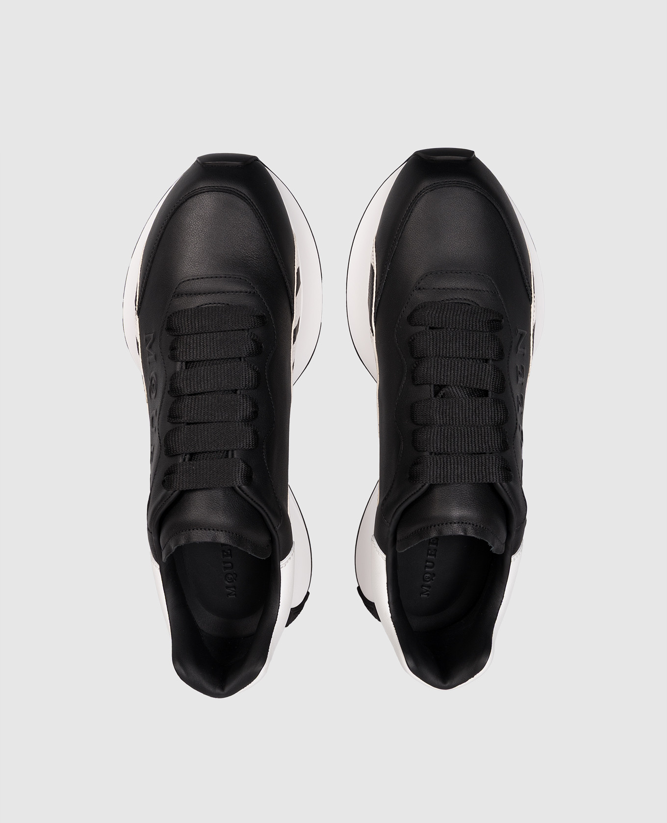 

Black leather sneakers with animal print Alexander McQueen