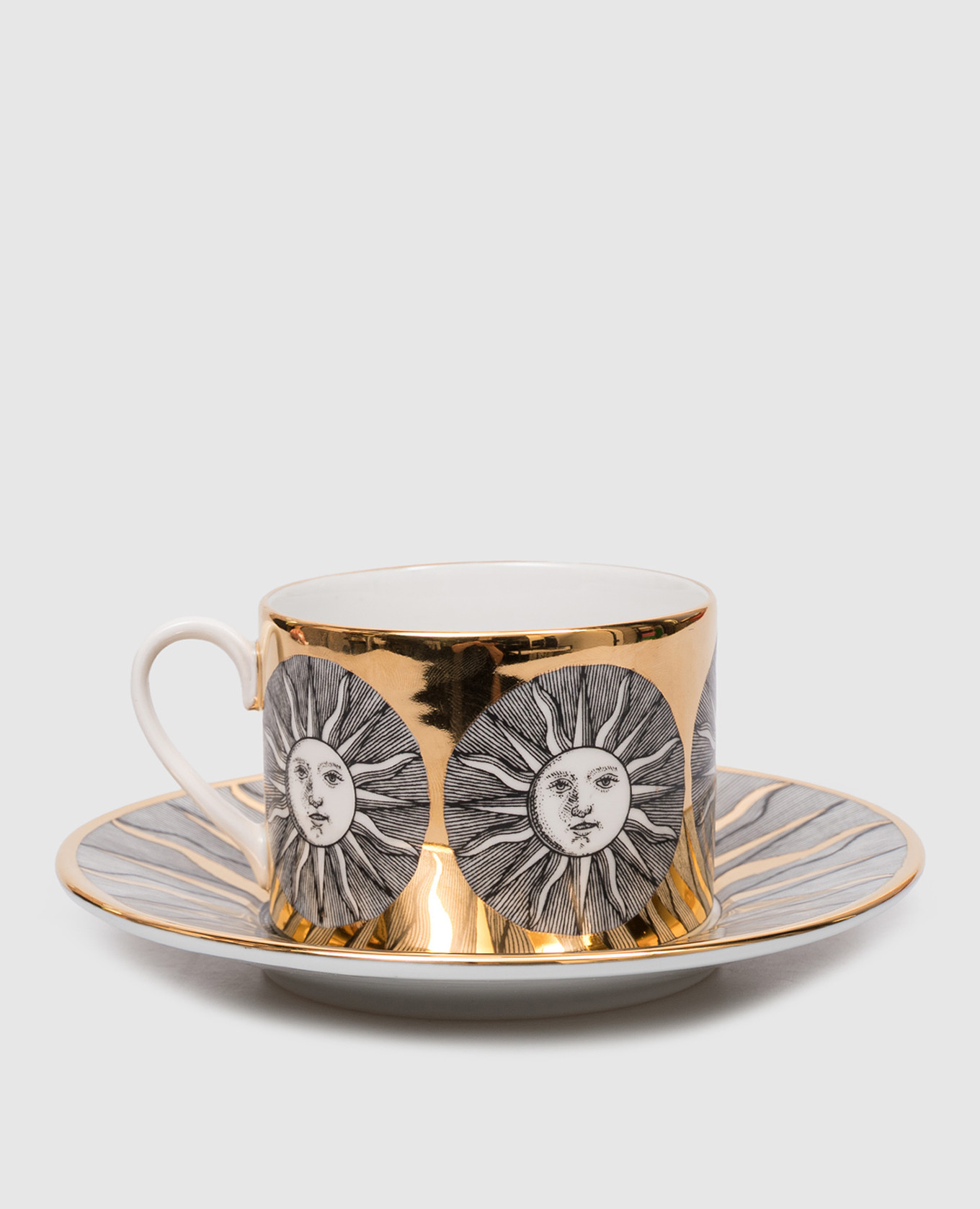 Tazza da tè e piattino in porcellana Sole