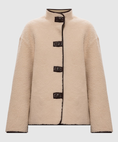 Reversible ivory sheepskin coat