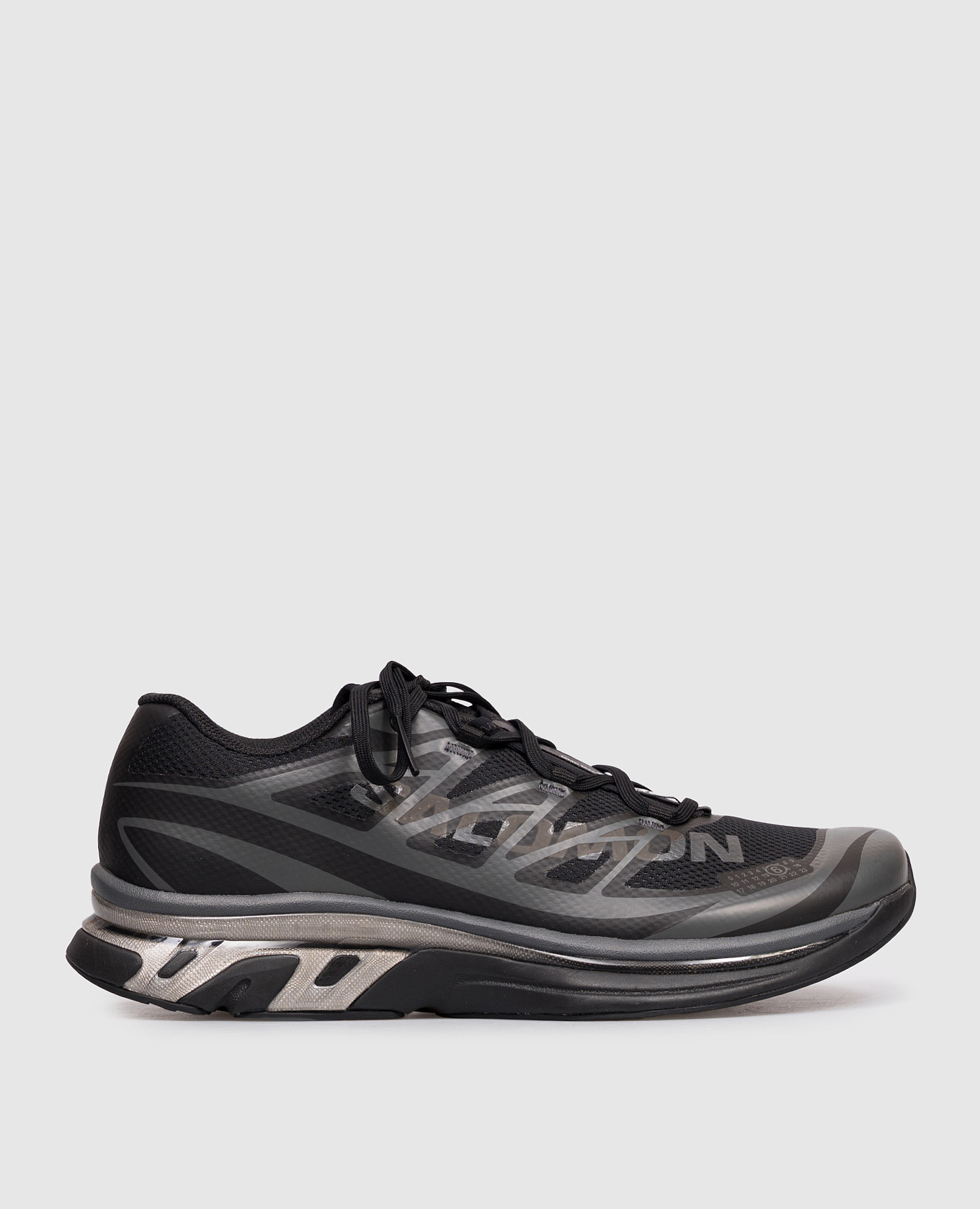 Black sneakers with logo print