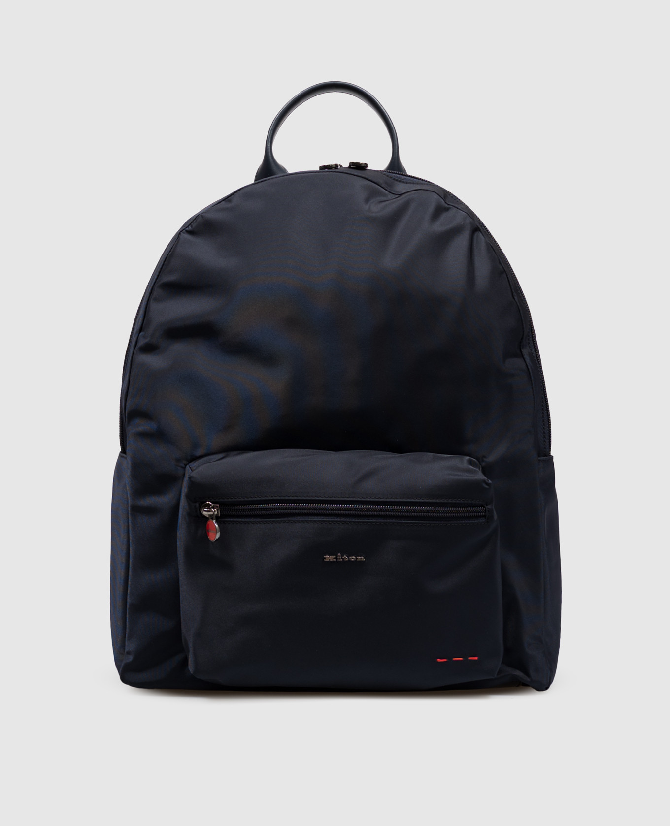 Blue backpack with metal logo