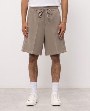 AMIRI Beige shorts with logo patch AMBMSO1082