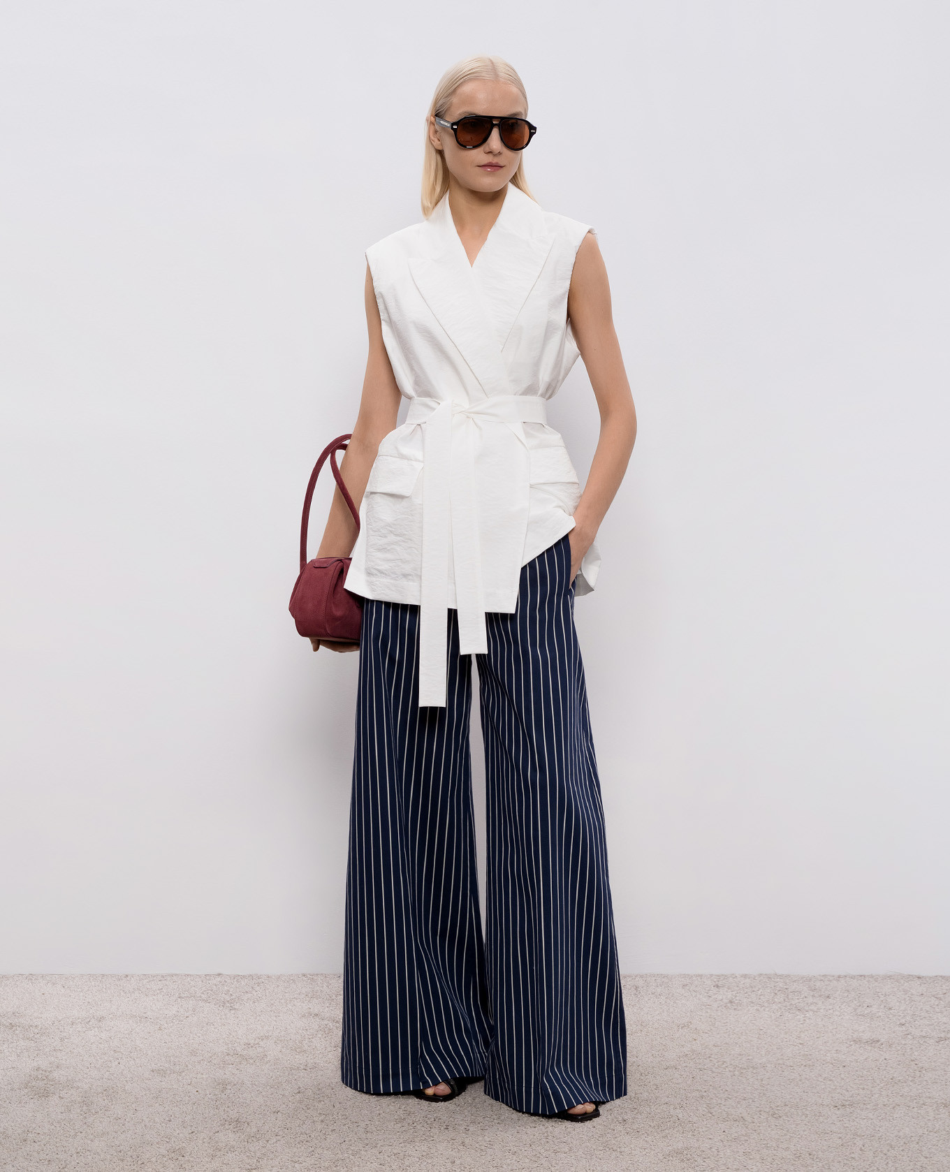 

White vest with a Monil chain Brunello Cucinelli