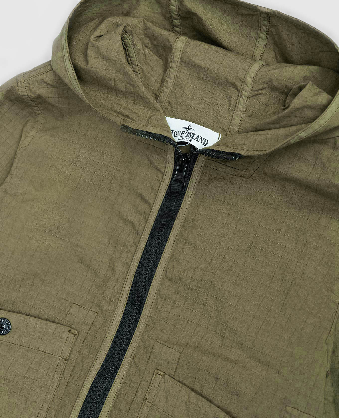 

Children's green jacket with logo patch Stone Island