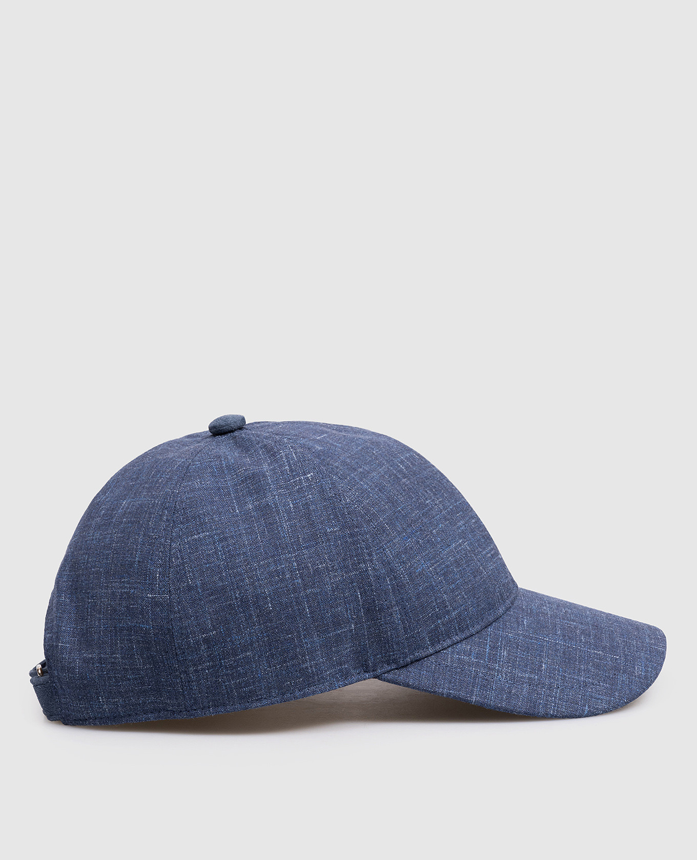 

Blue wool, silk and linen cap with emblem Brett Johnson