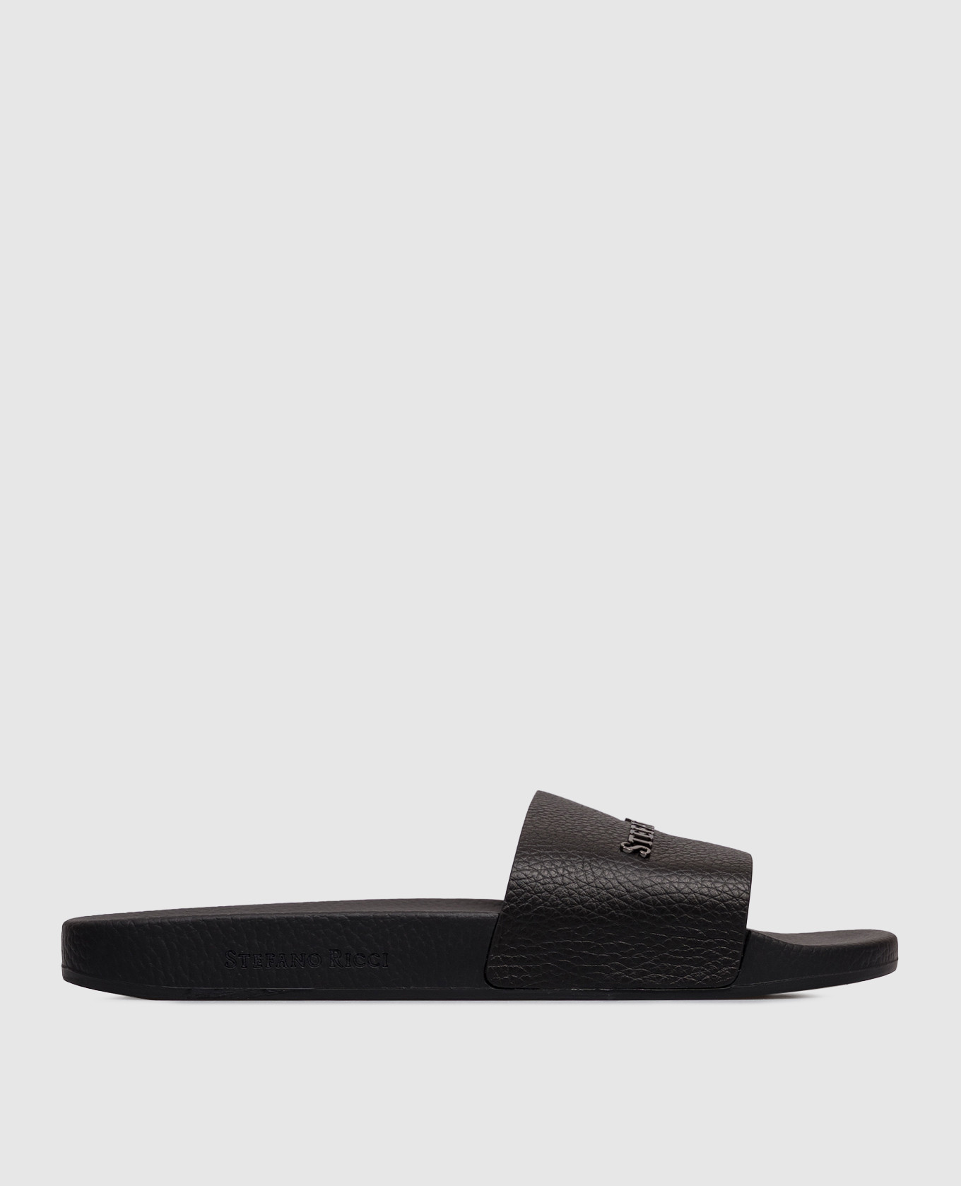 Black leather sliders with textured logo