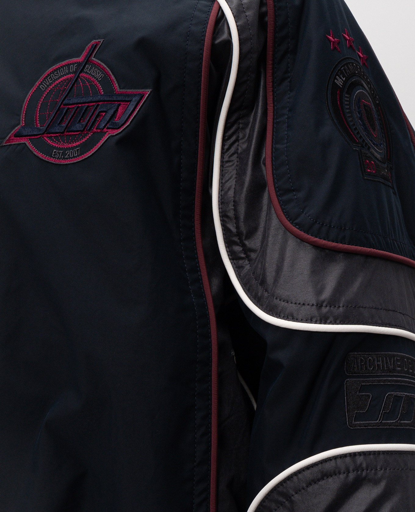 

Blue bomber jacket with branded patches Juun.j
