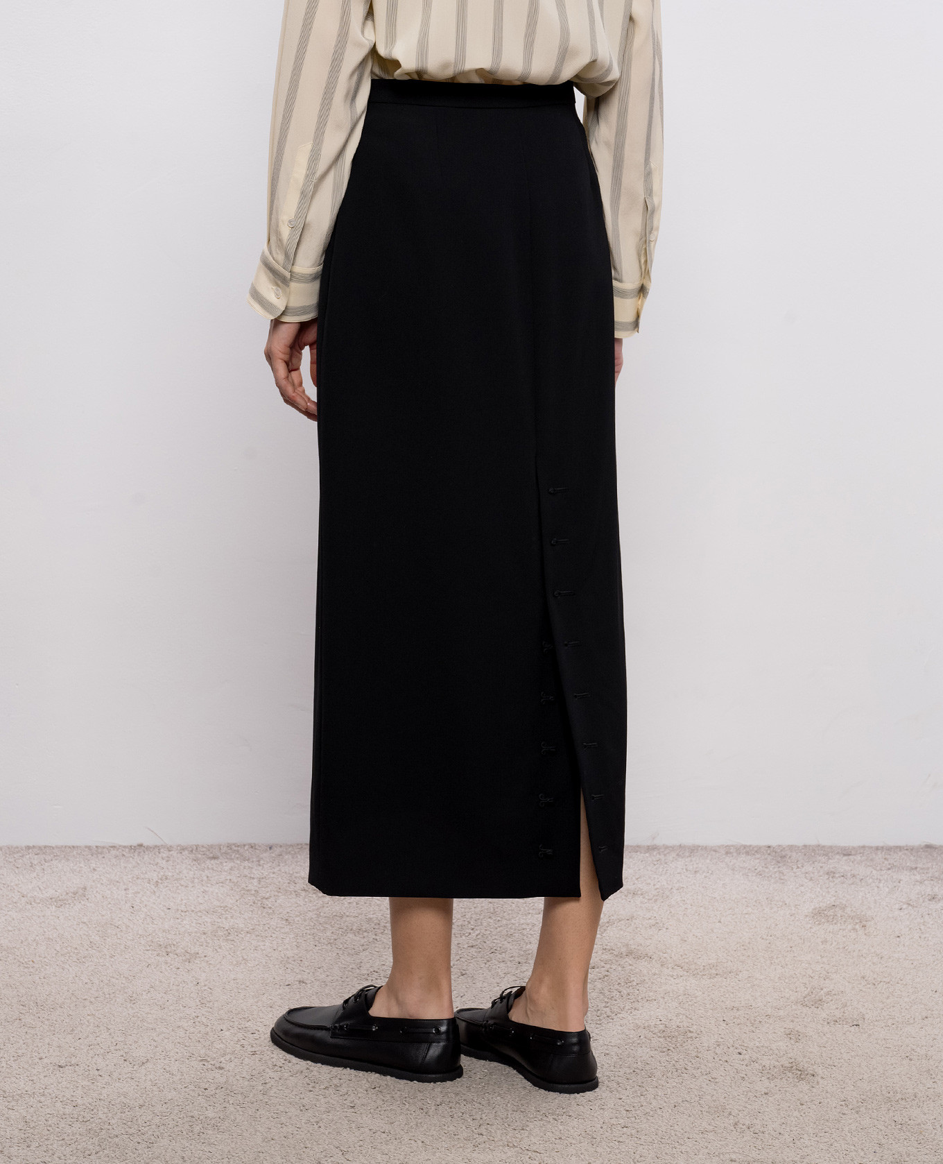

Edric black wool midi skirt The Row