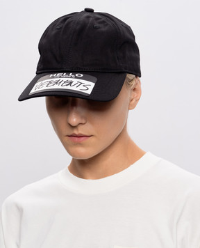 Vetements Black cap with print UA65CA160w