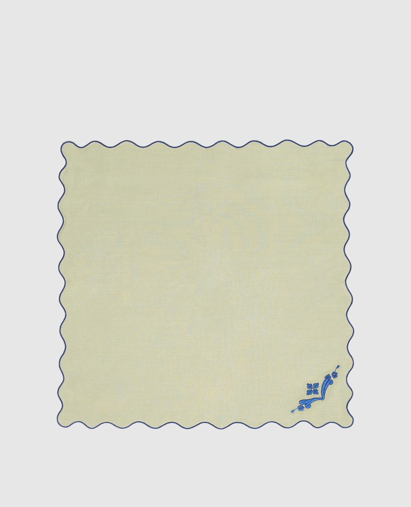 Green linen serving napkin with embroidery