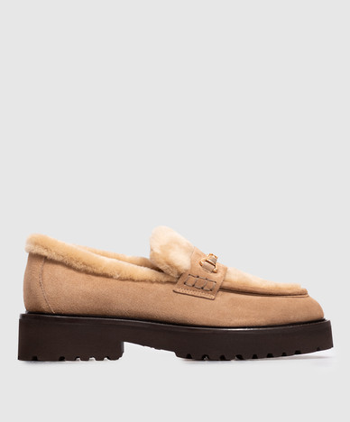 Beige suede loafers with fur trim