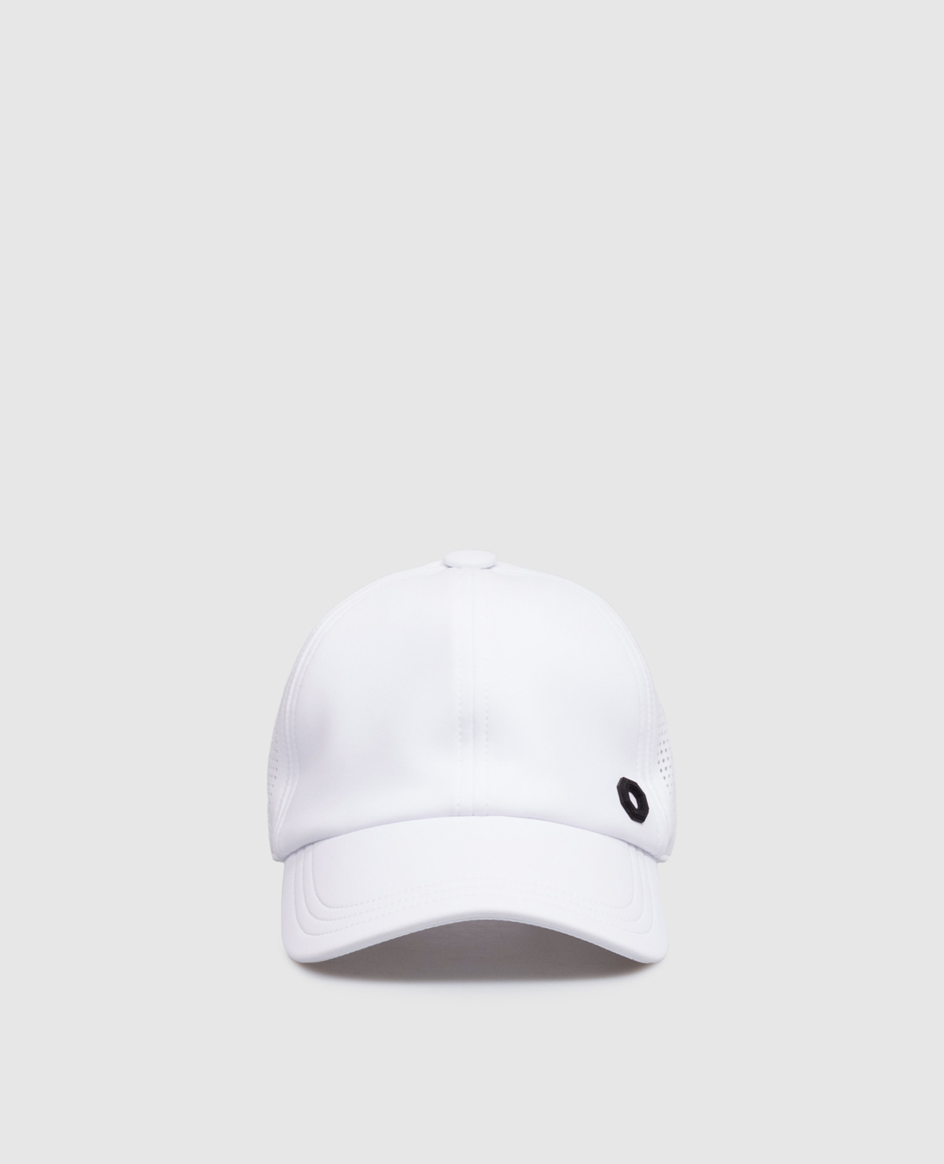 White cap with textured element