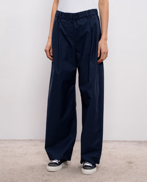 Brunello Cucinelli Blue pants with a monil chain ML140P9225