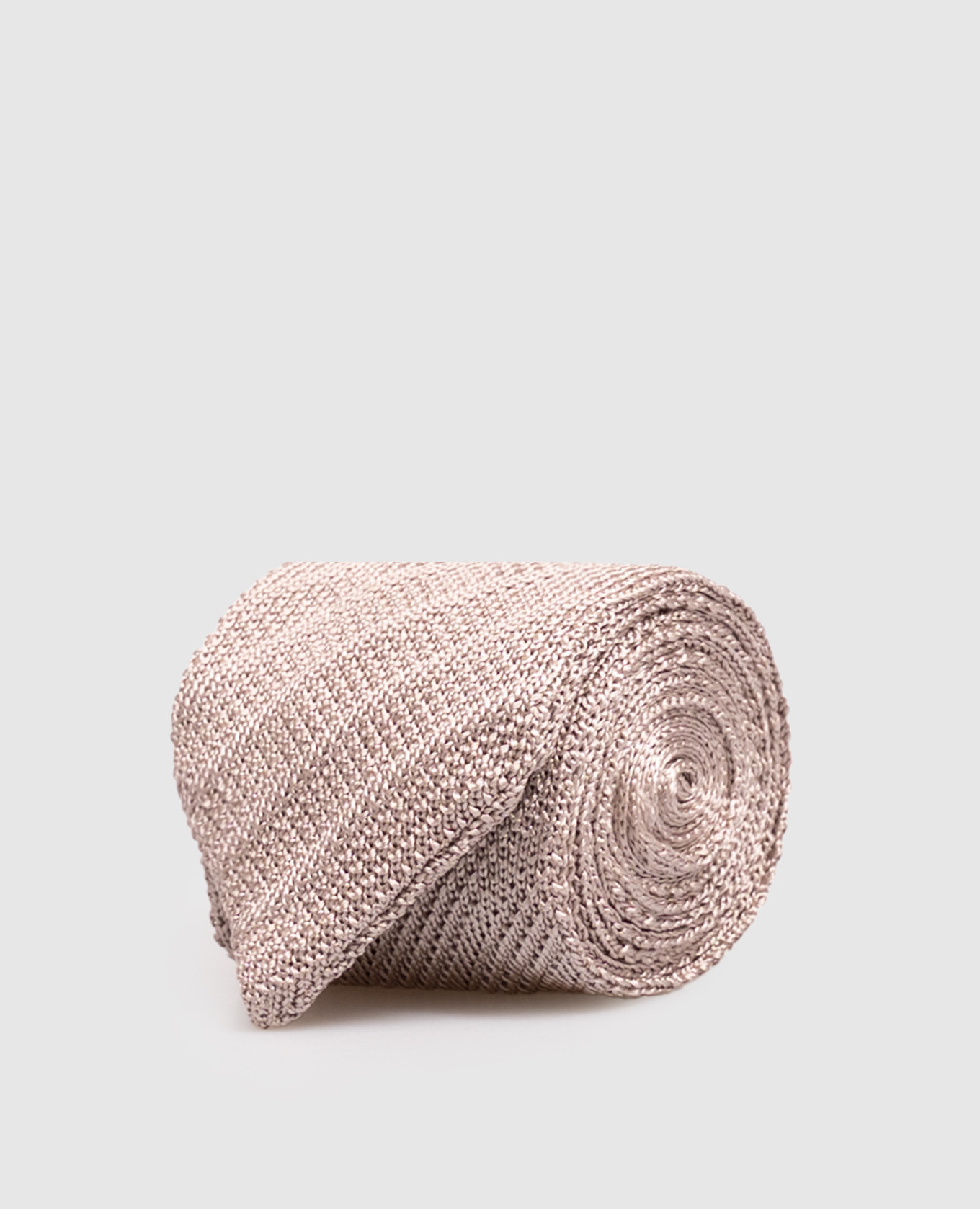 Beige silk tie with a pattern