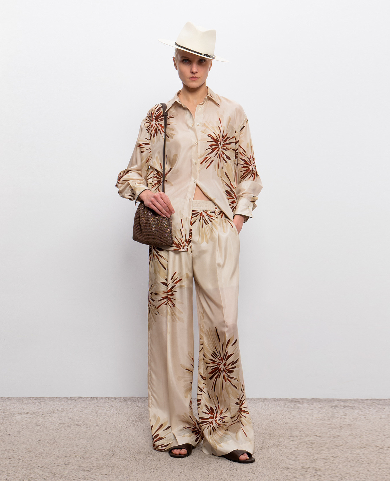 Beige silk blouse with branded print