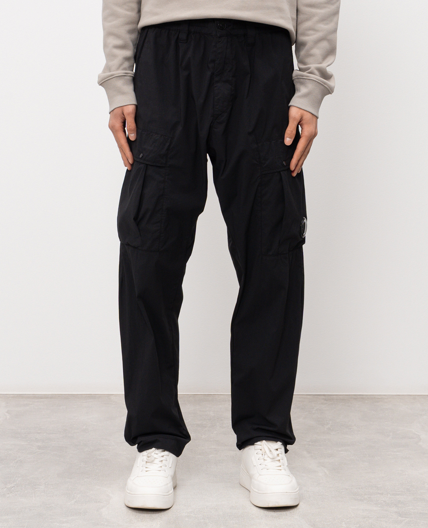 

Black cargo pants with logo patch C.P. Company