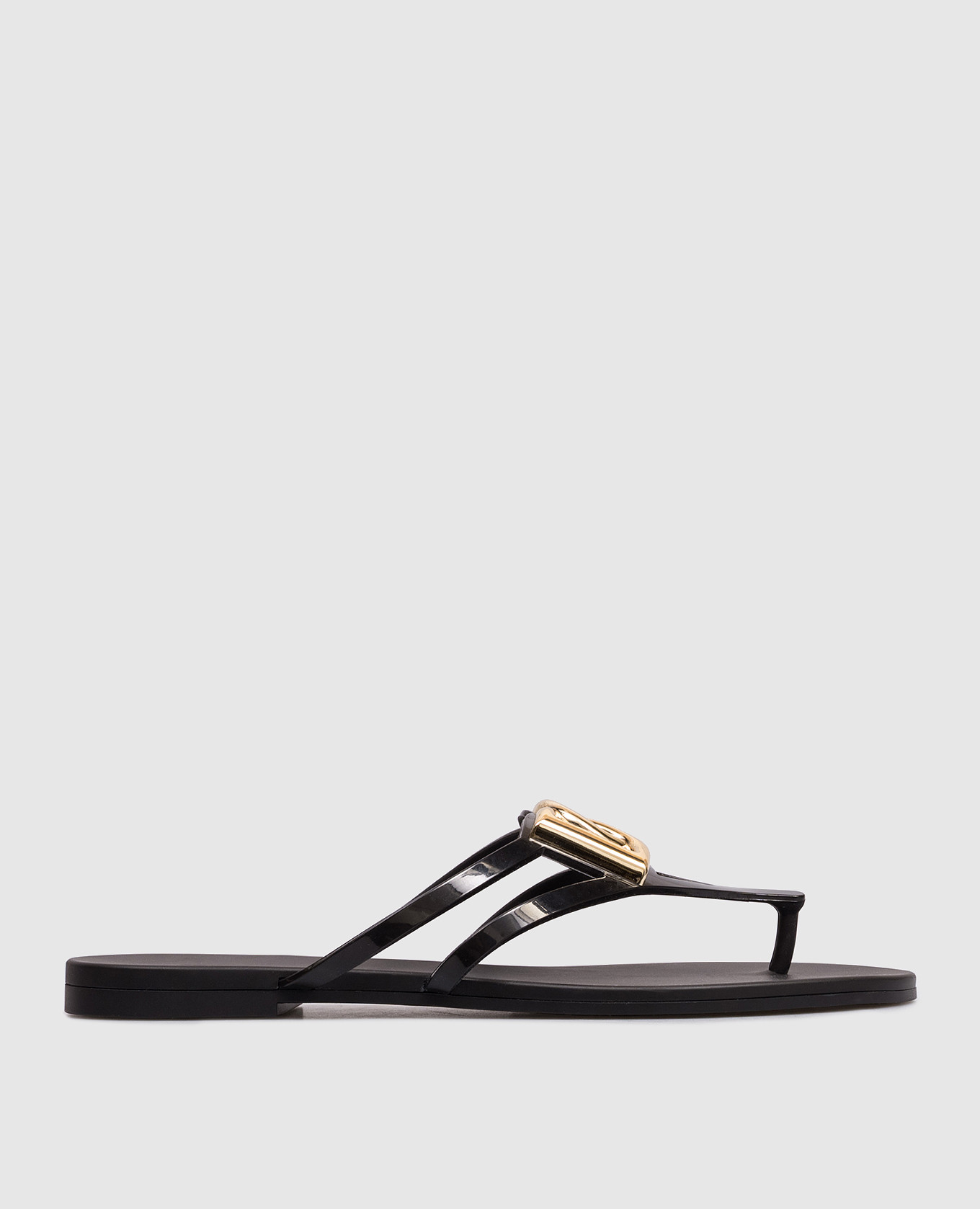 Black flip-flops with textured monogram