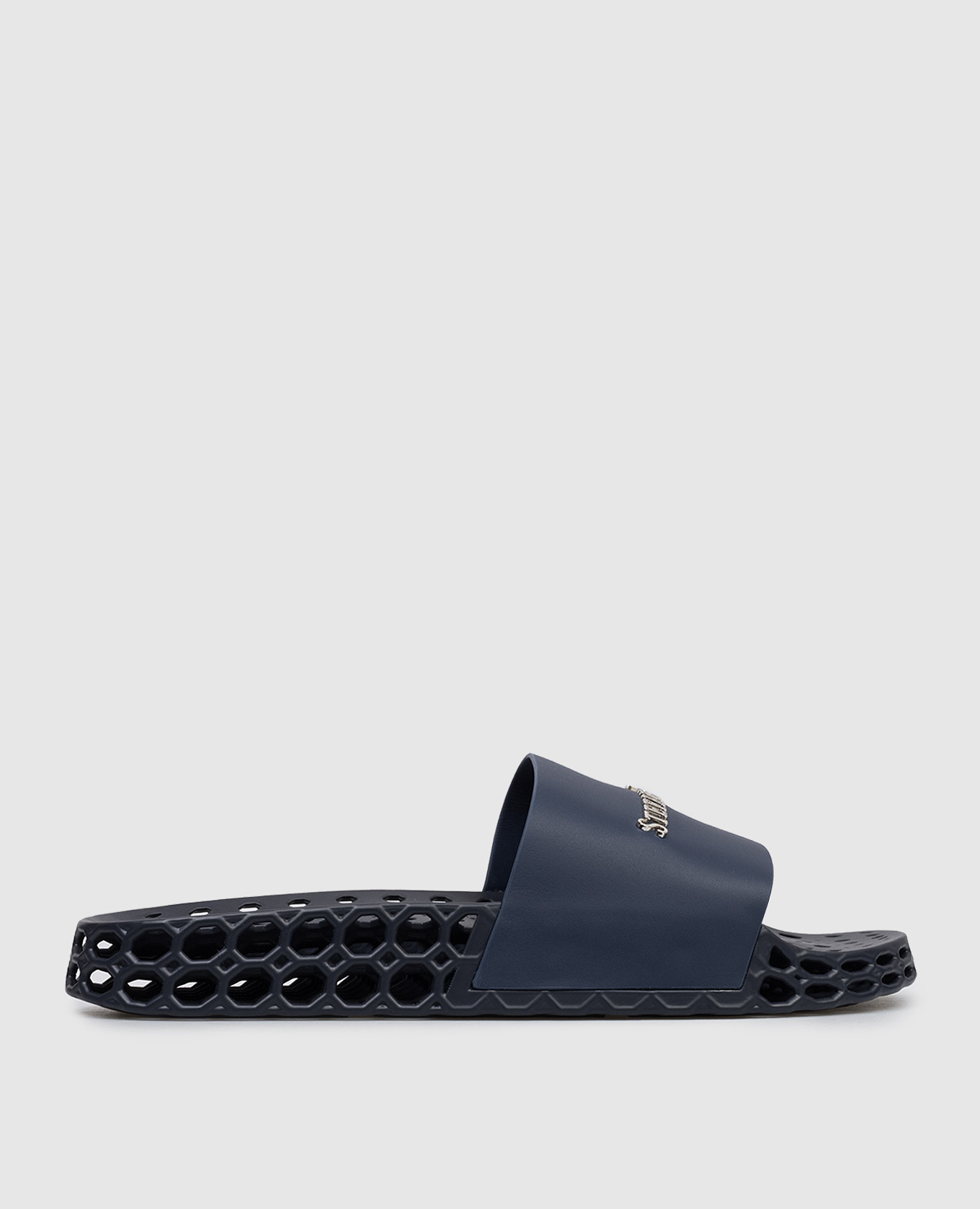 Blue leather sliders with textured logo