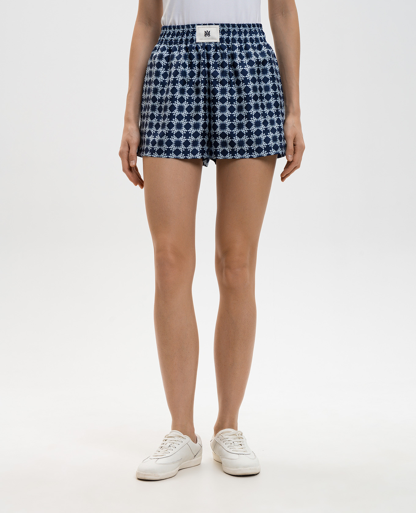 

Blue silk shorts with monogram logo print AMIRI