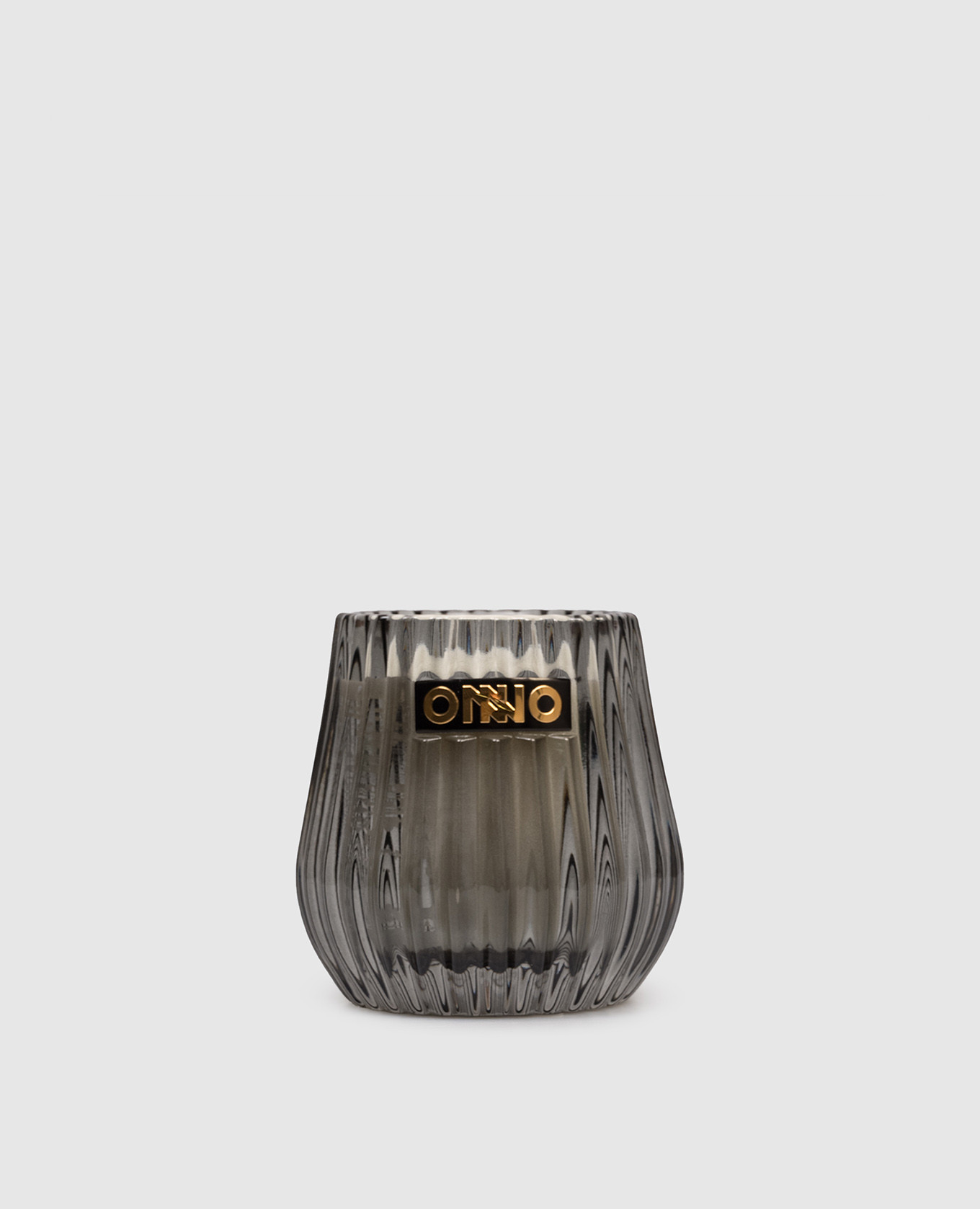 

Eclectic candle with Zanzibar scent in a glass candle holder Onno, Grey