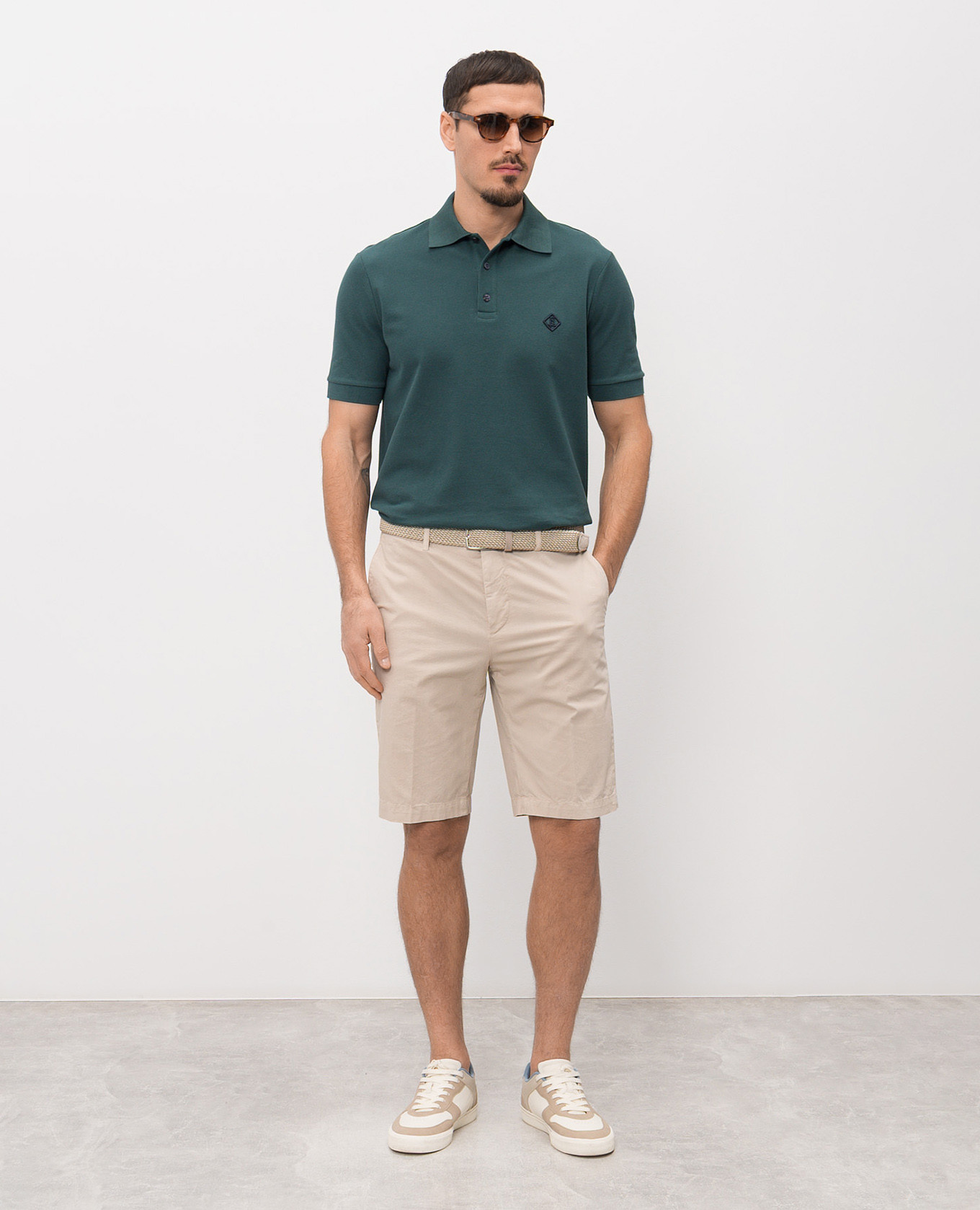 

Green polo shirt with monogram embroidery Herno