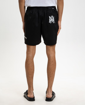 AMIRI Black logo print swim shorts AMBOSW1003