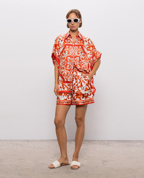 Dolce&Gabbana Silk shorts with branded print FTDB8TGDDRE