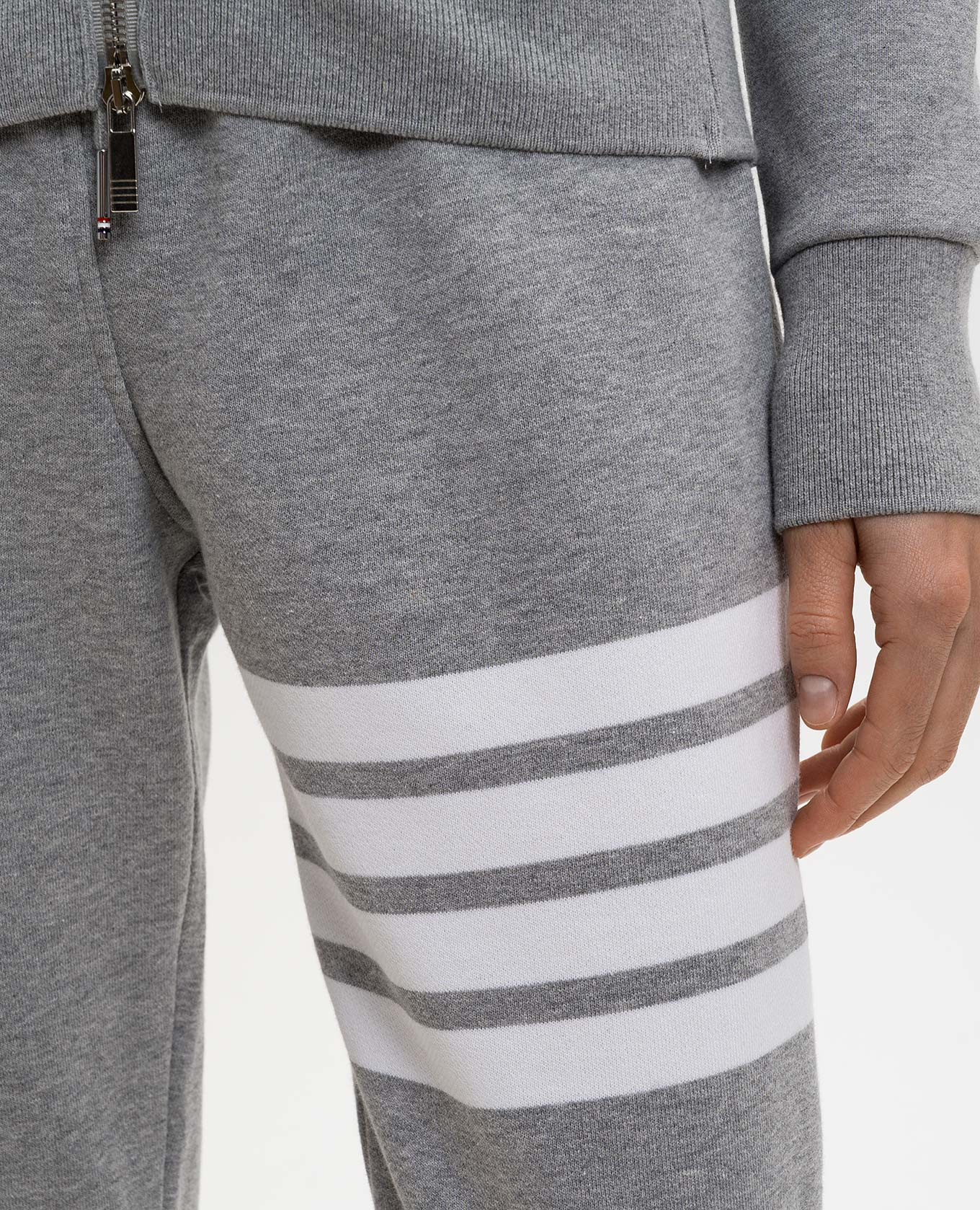 

Grey joggers with branded stripes Thom Browne