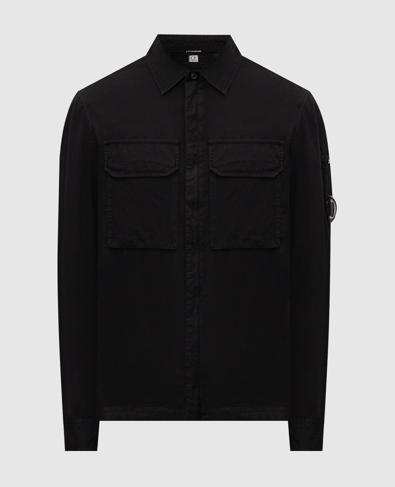 Black zip-up shirt with logo patch
